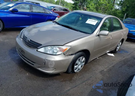 2002 Toyota Camry Le z USA, uszkodzony, nr VIN 4T1BE32K52U103917
